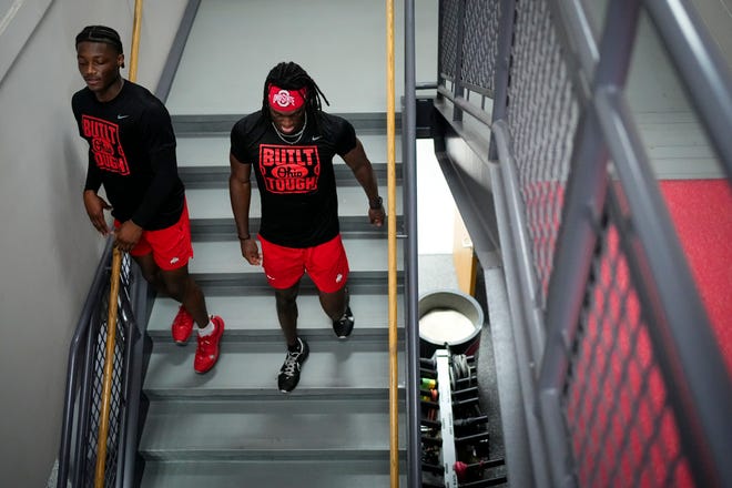 Jul 21, 2023; Columbus, Ohio, USA;  Ohio State Buckeyes wide receivers Marvin Harrison Jr. and Carnell Tate work out at the Woody Hayes Athletic Center prior to the start of fall camp.