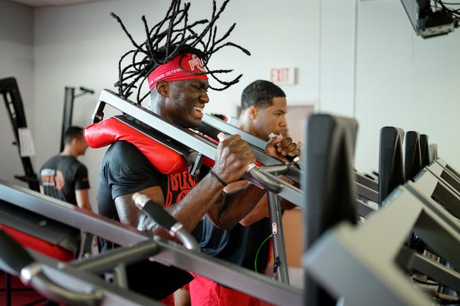 Jul 21, 2023; Columbus, Ohio, USA;  Ohio State Buckeyes wide receiver Marvin Harrison Jr. works out on a squat thrust machine at the Woody Hayes Athletic Center prior to the start of fall camp.