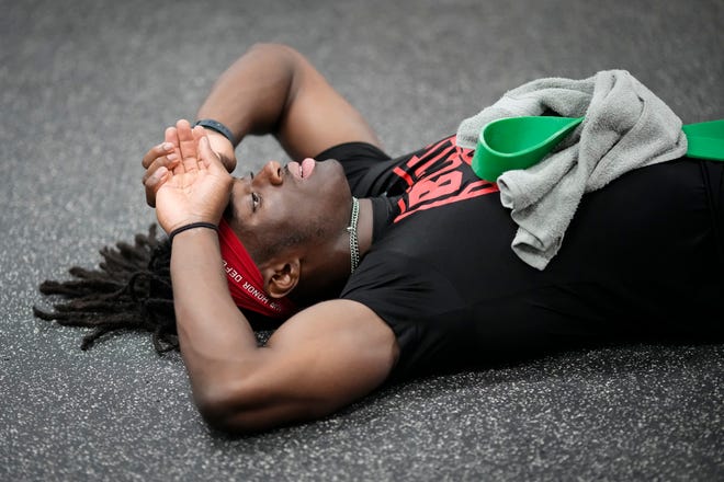 Jul 21, 2023; Columbus, Ohio, USA;  Ohio State Buckeyes wide receiver Marvin Harrison Jr. shows exhaustion during a summer workout at the Woody Hayes Athletic Center prior to the start of fall camp.