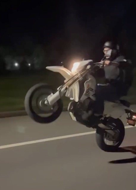 Colin shared video of a motorcyclist performing a wheelie
