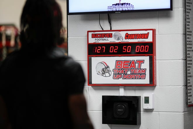 Jul 21, 2023; Columbus, Ohio, USA;  A countdown to the game against Michigan ticks down behind Ohio State Buckeyes wide receiver Marvin Harrison Jr. as he works out at the Woody Hayes Athletic Center prior to the start of fall camp.