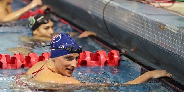 Lia Thomas of the Pennsylvania Quakers smiles after winning the 200 meter freestyle event during a tri-meet against the Yale Bulldogs and the Dartmouth Big Green at Sheerr Pool on the campus of the University of Pennsylvania on January 8, 2022 in Philadelphia, Pennsylvania.