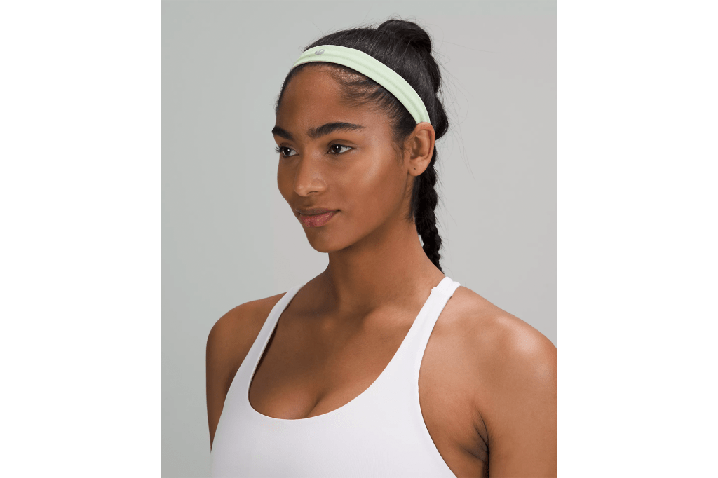 Woman wearing mint colored headband