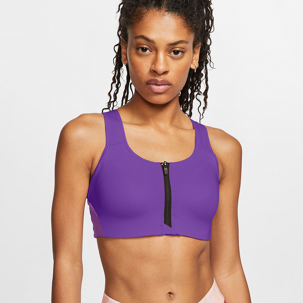 Purple zip-up sports bra on model